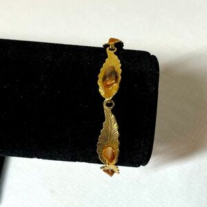 Vintage Gold Tone Leaf Bracelet with brown stones. Strong clasp.